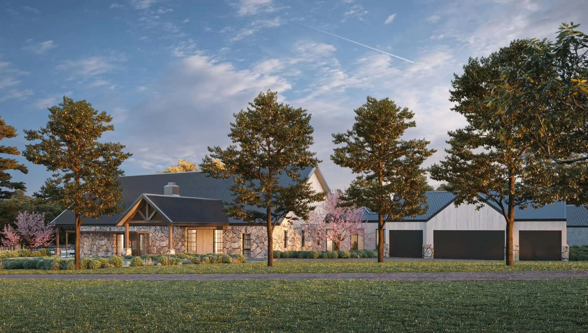 Wide view of a stone and timber home across a lawn